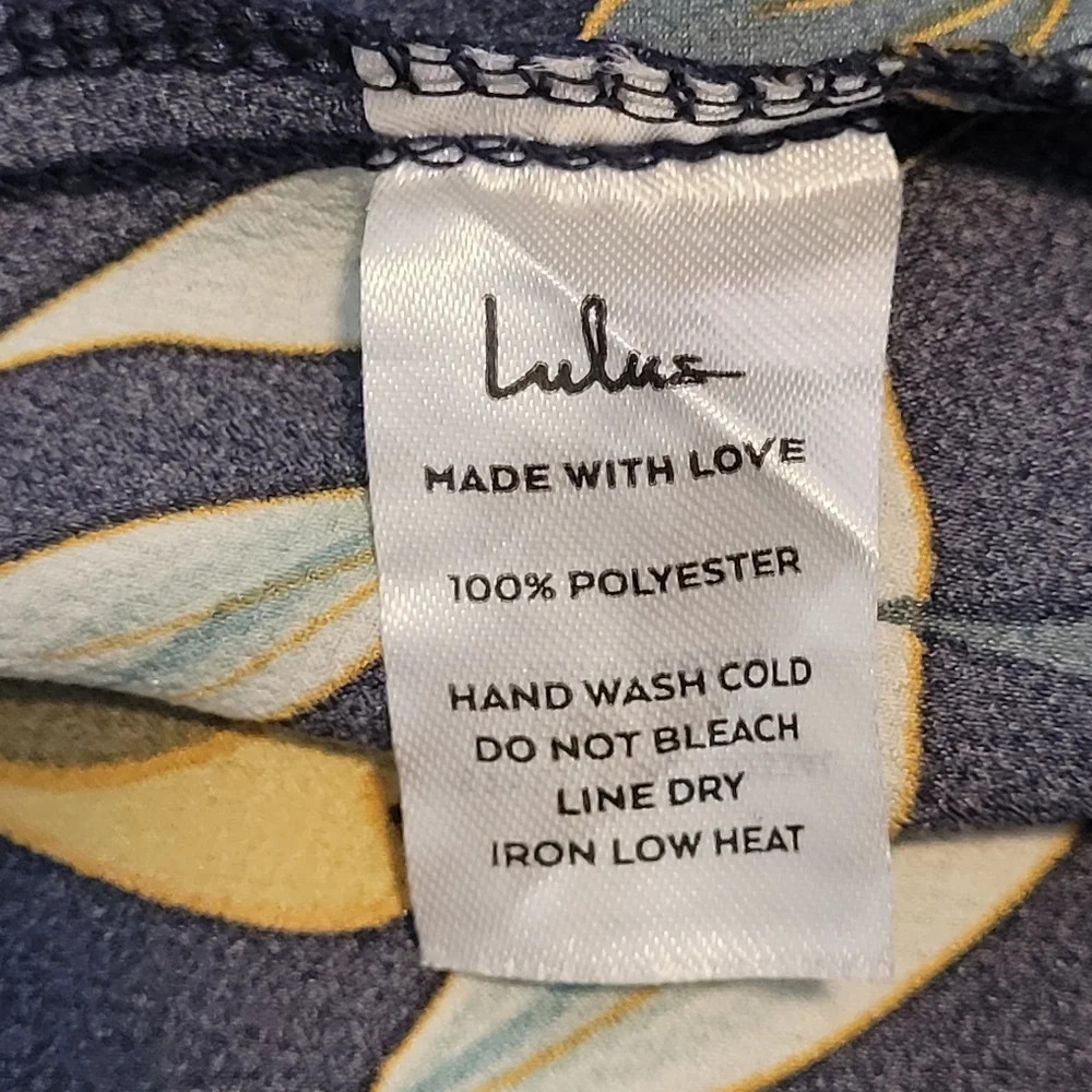 Lulus navy floral wrap dress with tie waist and long sleeves. Size Medium - Picture 8 of 12